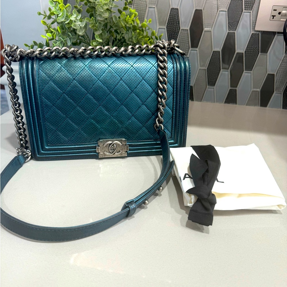 Chanel medium quilted boy flat bag..